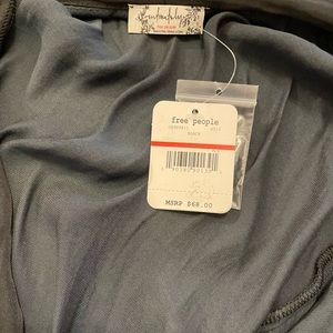 Free People Black deep V bodysuit. New with tags.